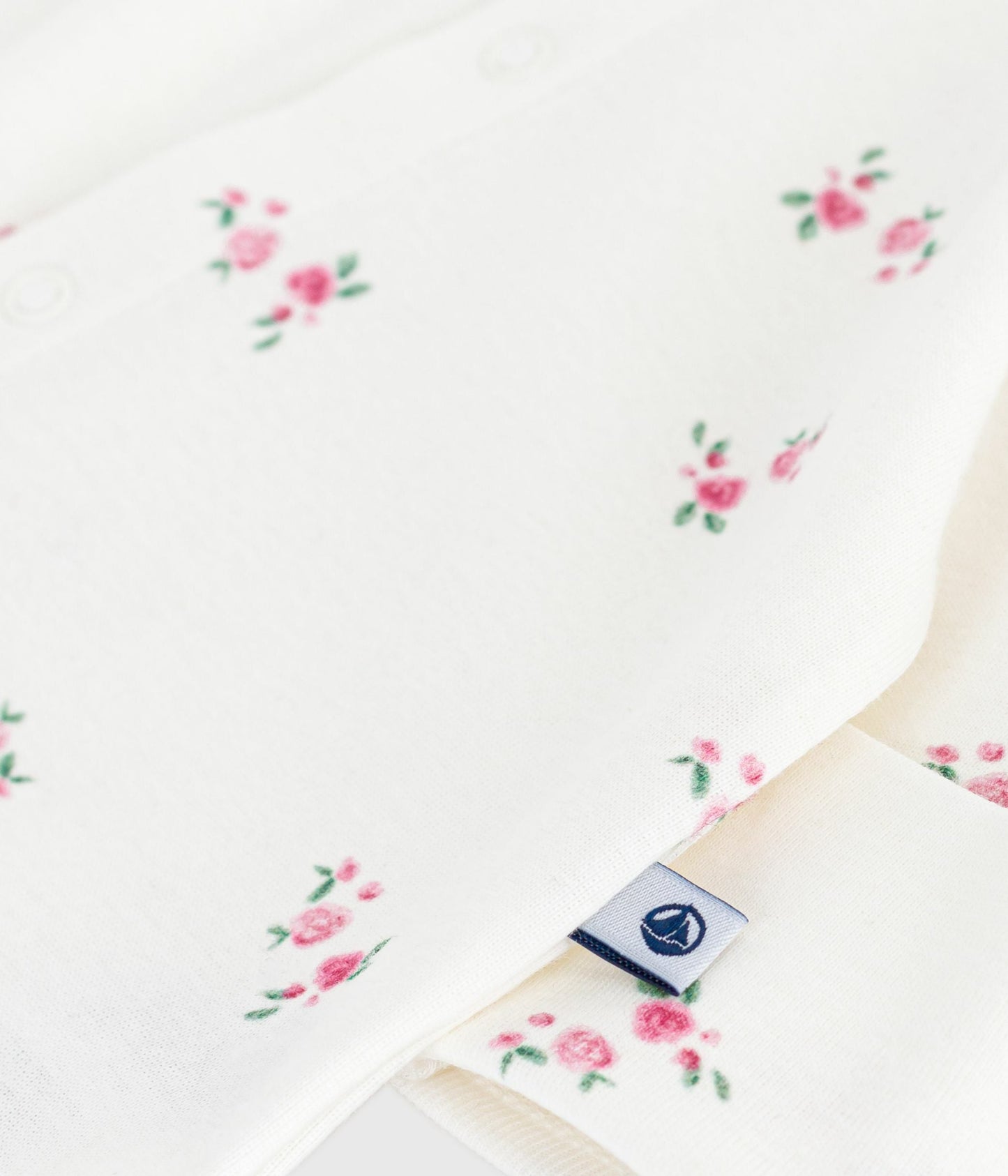 Pyjama bébé en coton à col fleuri