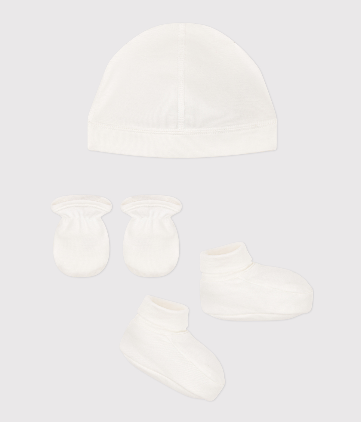 Lot de bonnet, chaussons et moufles bébé
