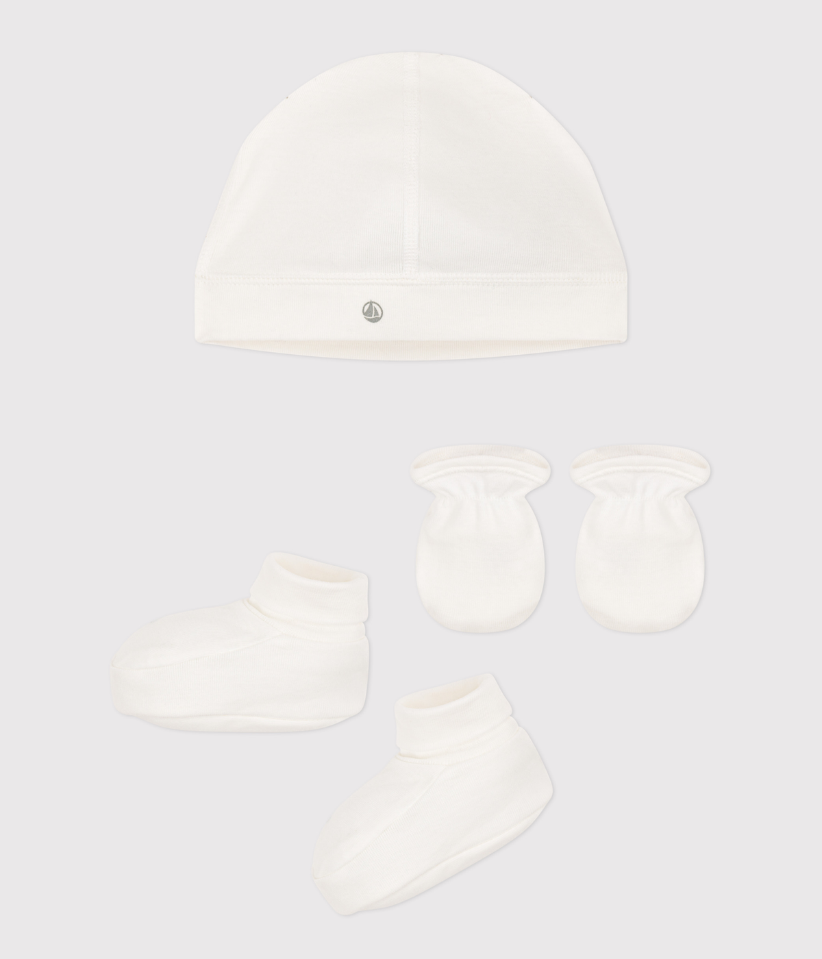 Lot de bonnet, chaussons et moufles bébé