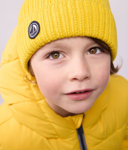 Bonnet enfant en tricot doublé en polaire