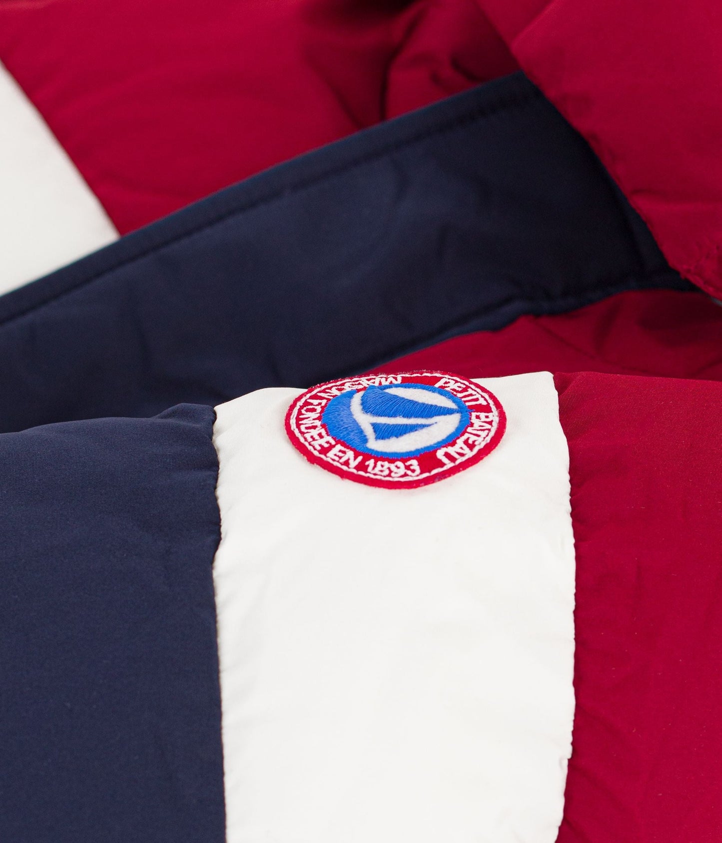 Doudoune fine bébé unie colorblock