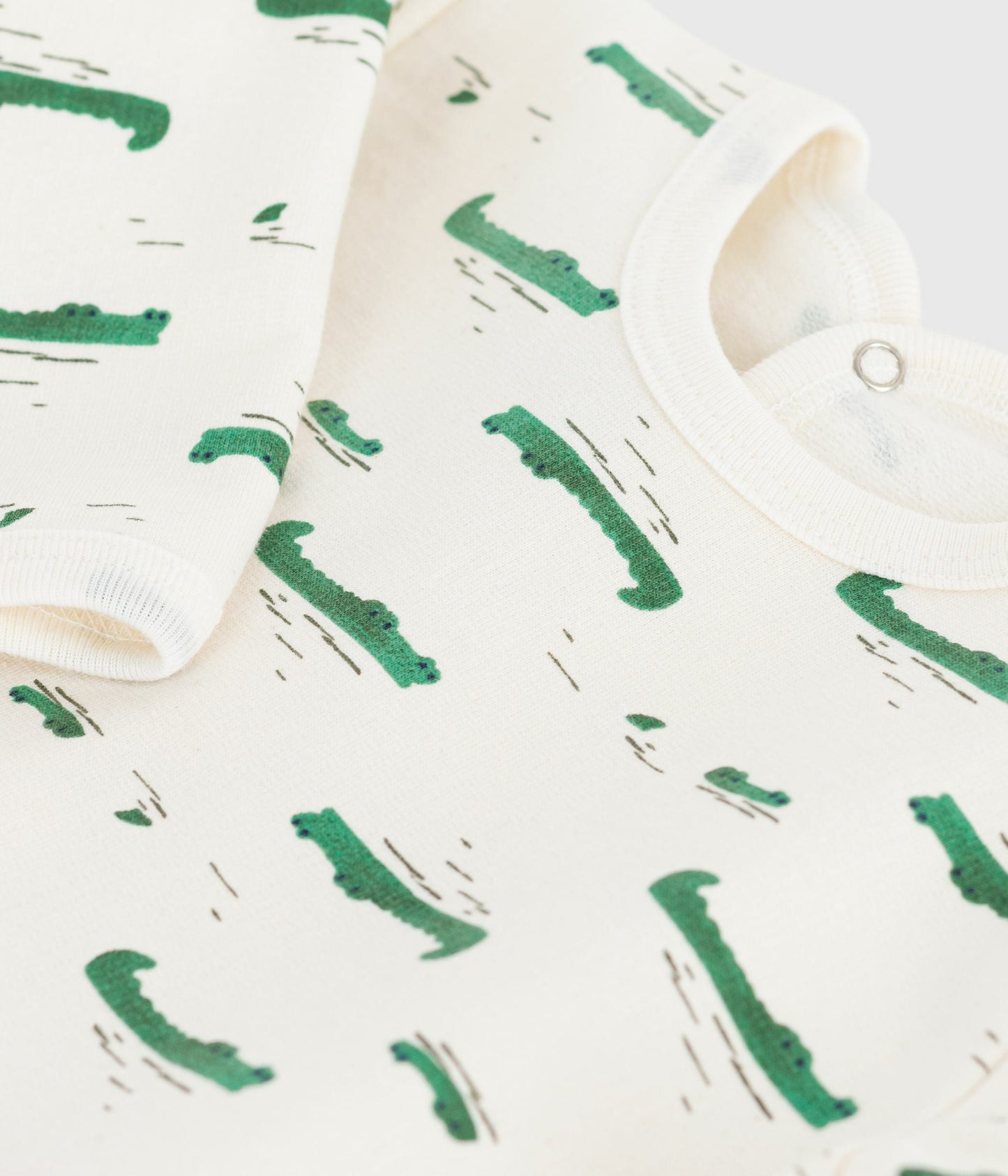 Pyjama bébé en molleton gratté ouverture au dos imprimé croco