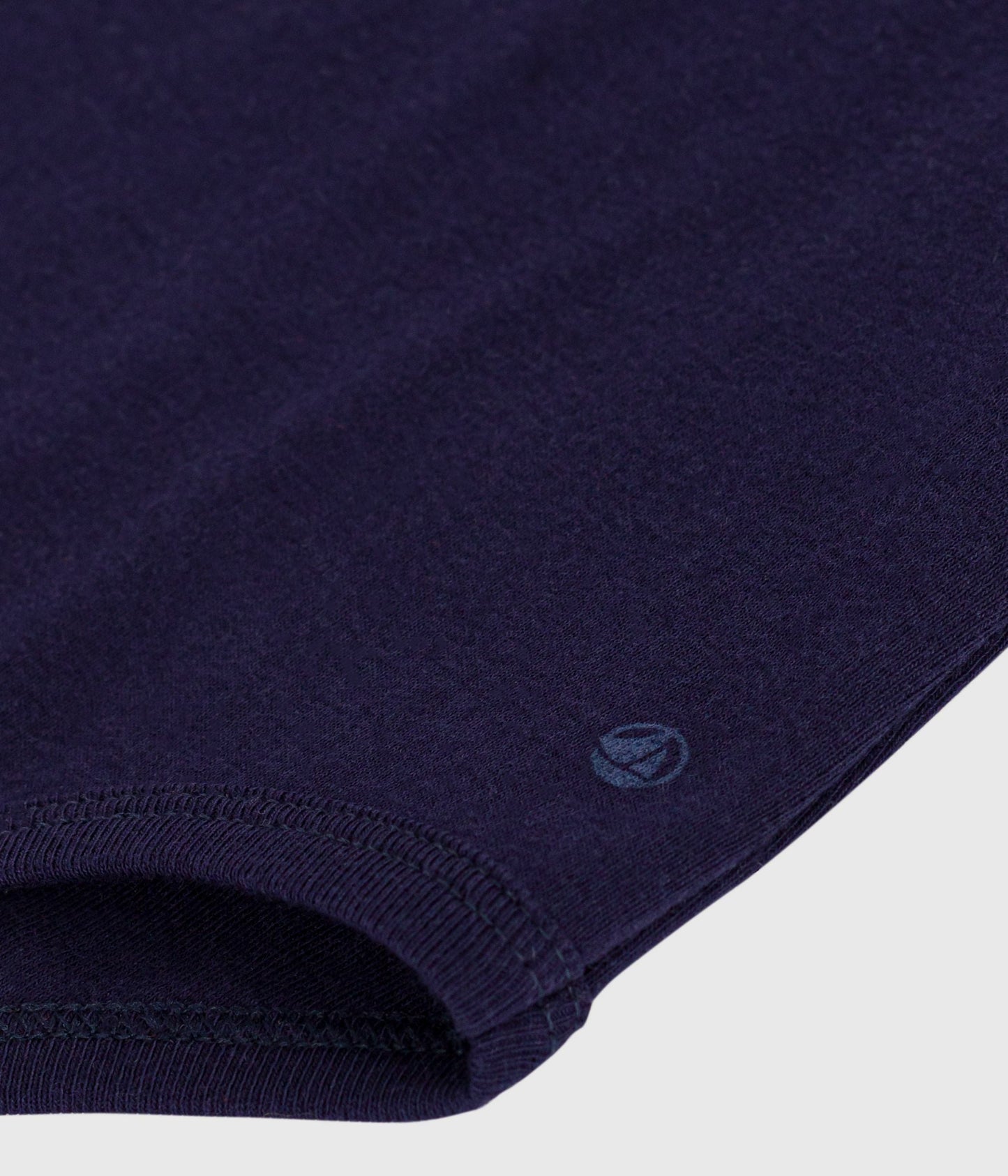 Body bébé col roulé en coton uni