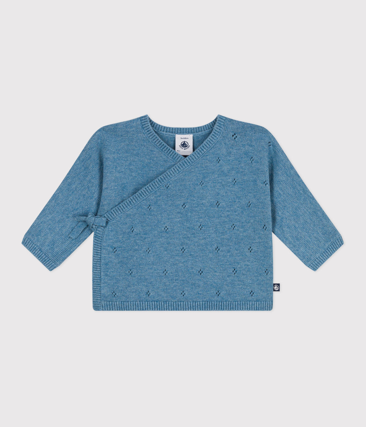 Openwork wrap-style baby cardigan in wool and cotton knit