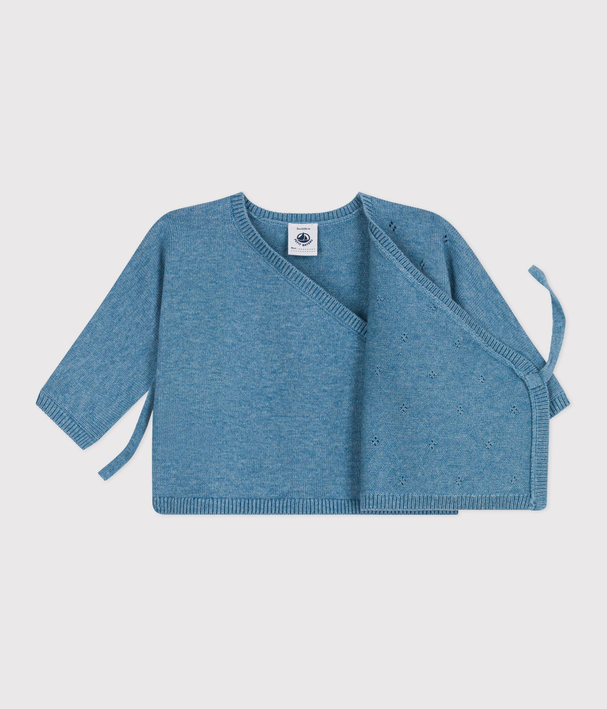 Openwork wrap-style baby cardigan in wool and cotton knit