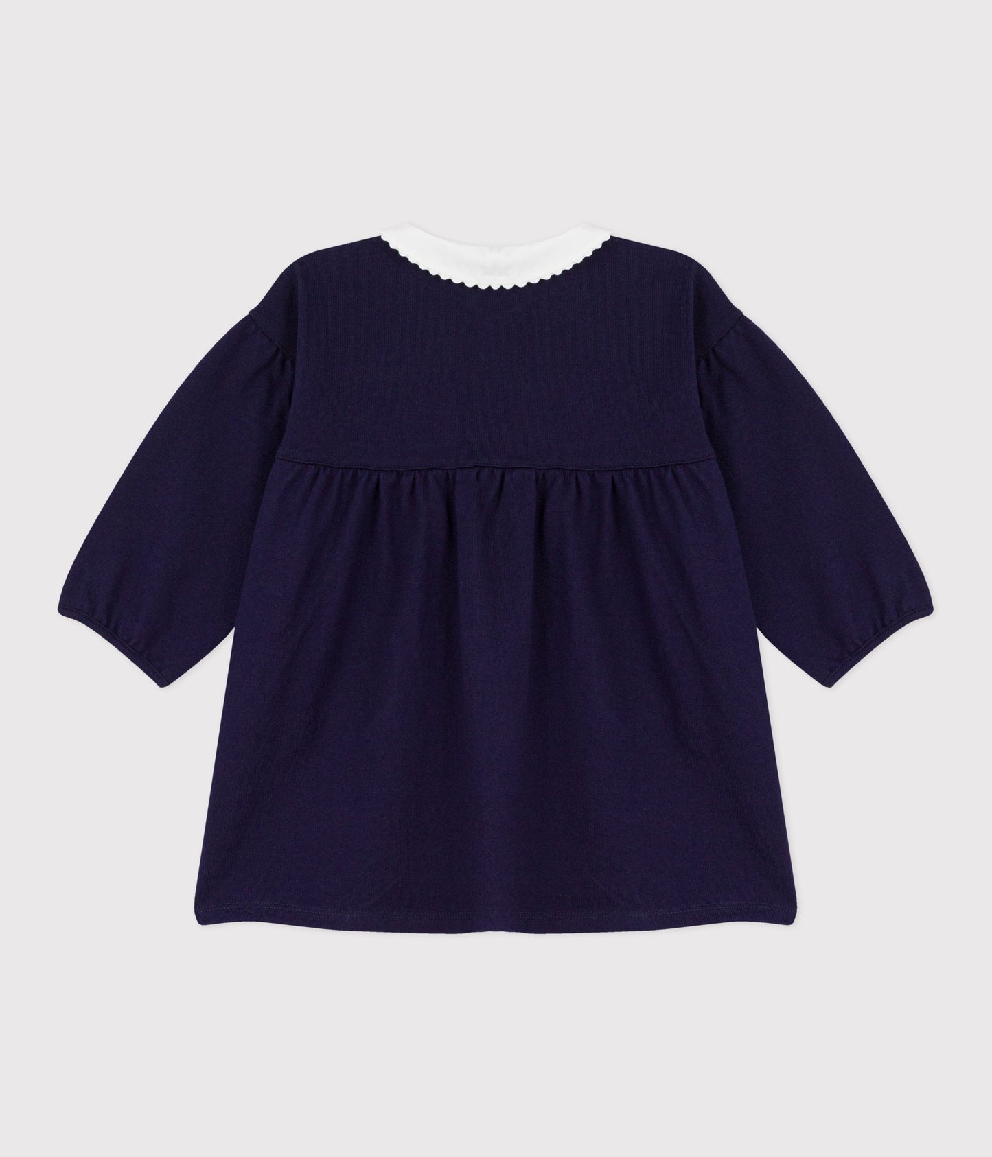 Robe bébé en coton manhces longues unie à col et détails brodés