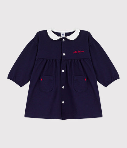 Robe bébé en coton manhces longues unie à col et détails brodés