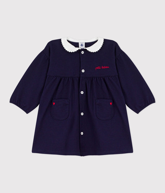 Robe bébé en coton manhces longues unie à col et détails brodés