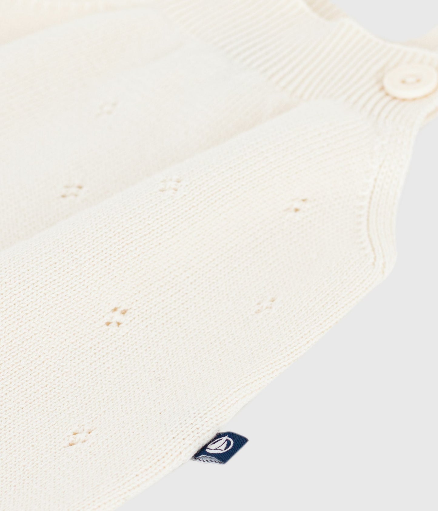 Combinaison courte bébé en tricot de coton ajouré – Z1