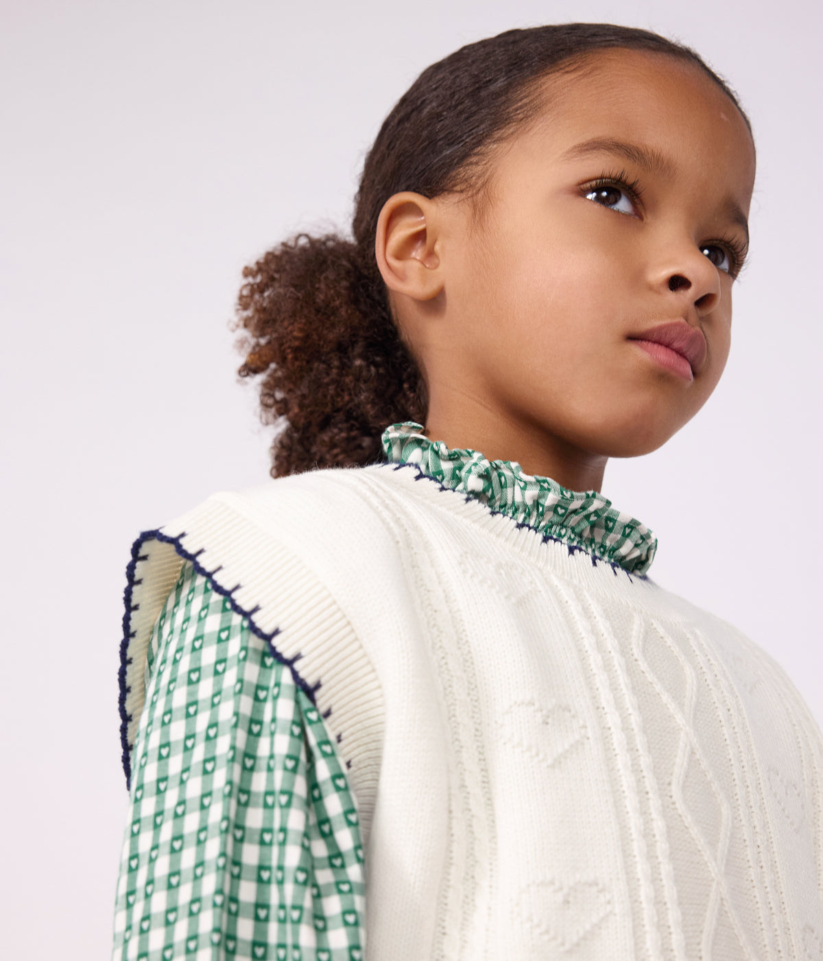pull a torsades enfant en laine et coton sans manche