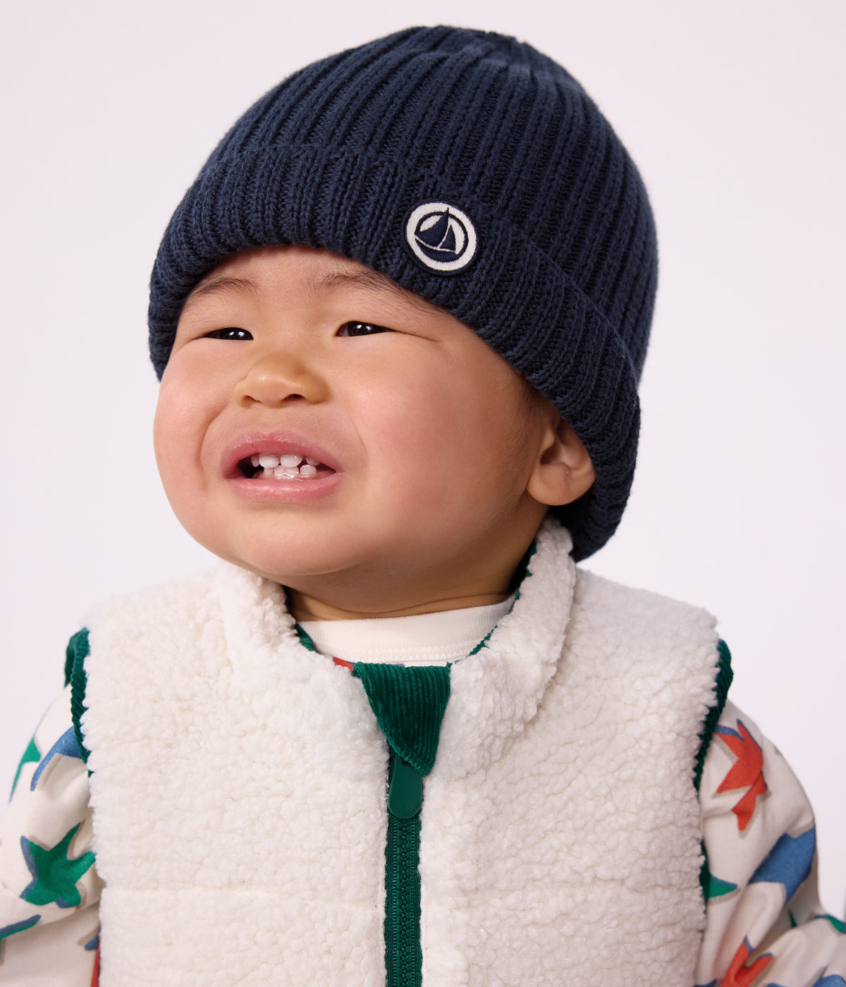 bonnet bebe en tricot double en polaire bleu marine