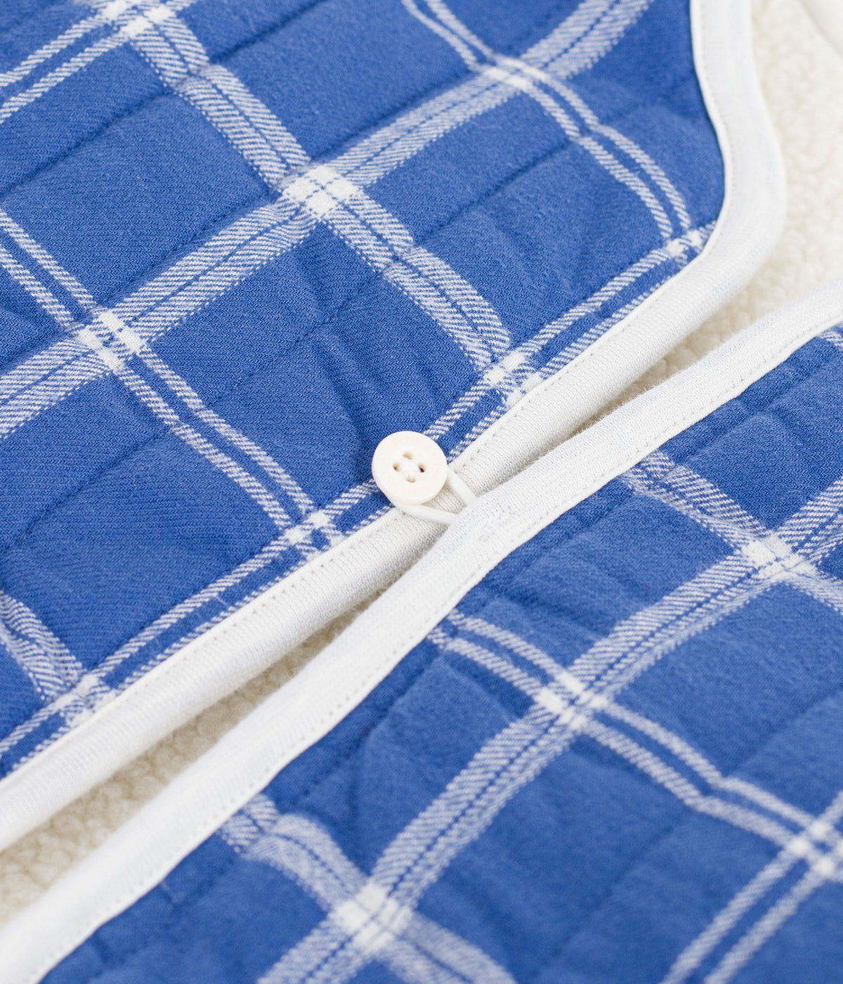 Sleeveless flannel and sherpa check baby gilet