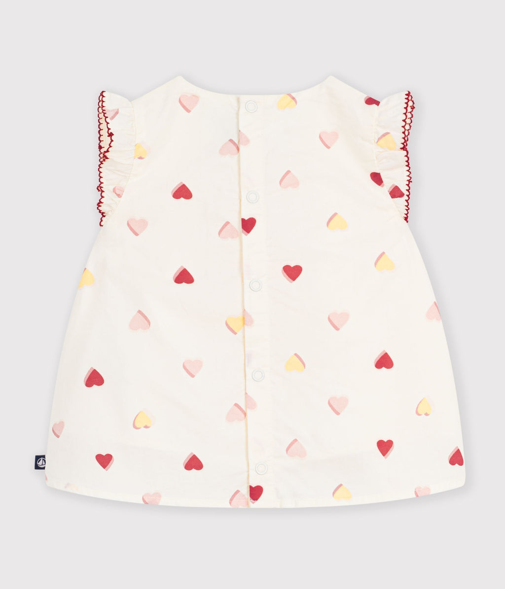 Sleeveless cotton poplin baby blouse with heart print