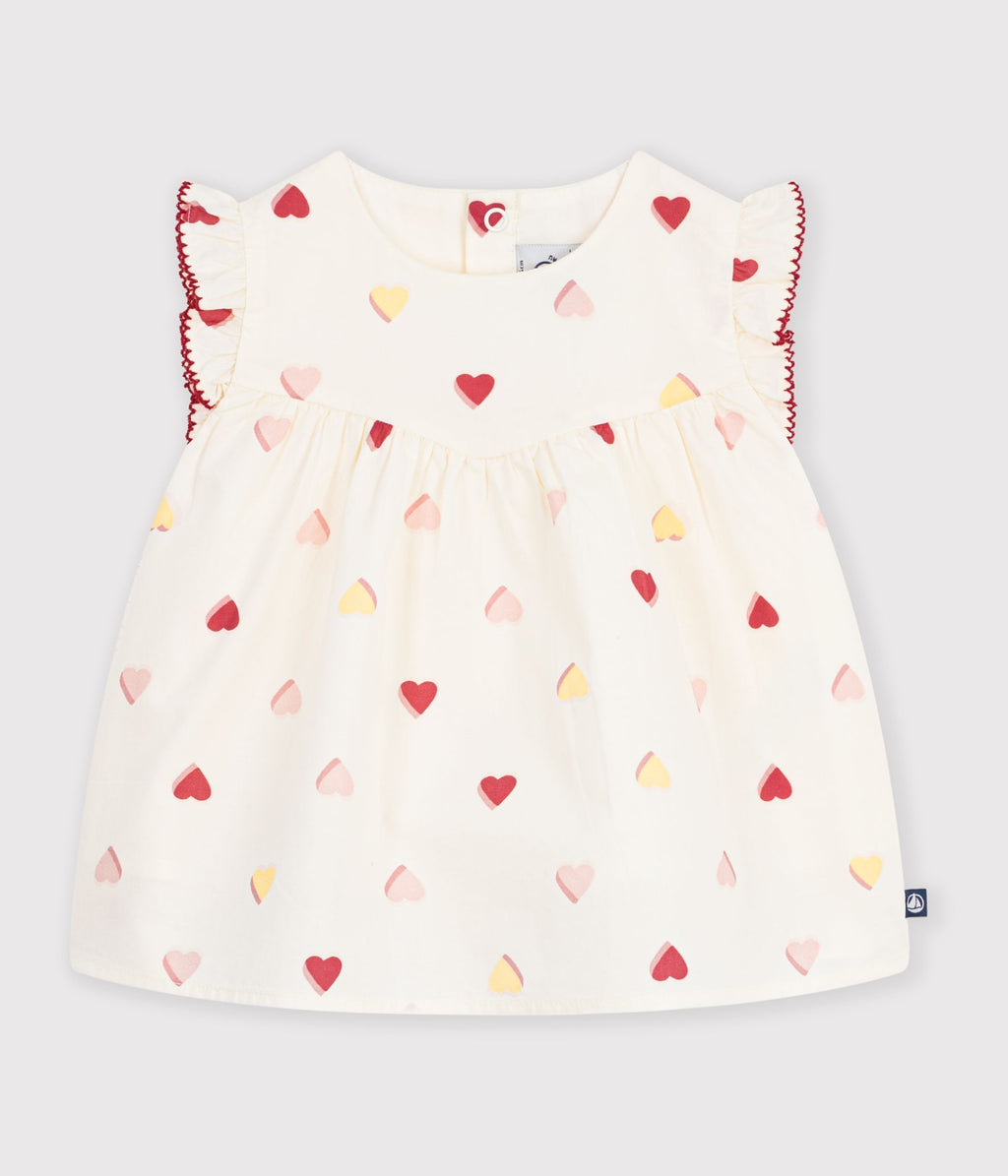 Sleeveless cotton poplin baby blouse with heart print