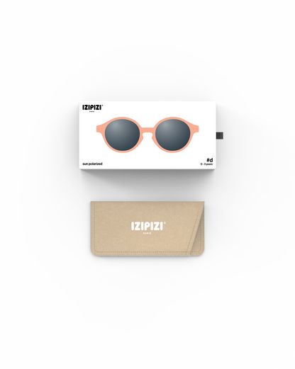 Lunettes solaires enfant Izipizi Apricot forme D Baby packaging